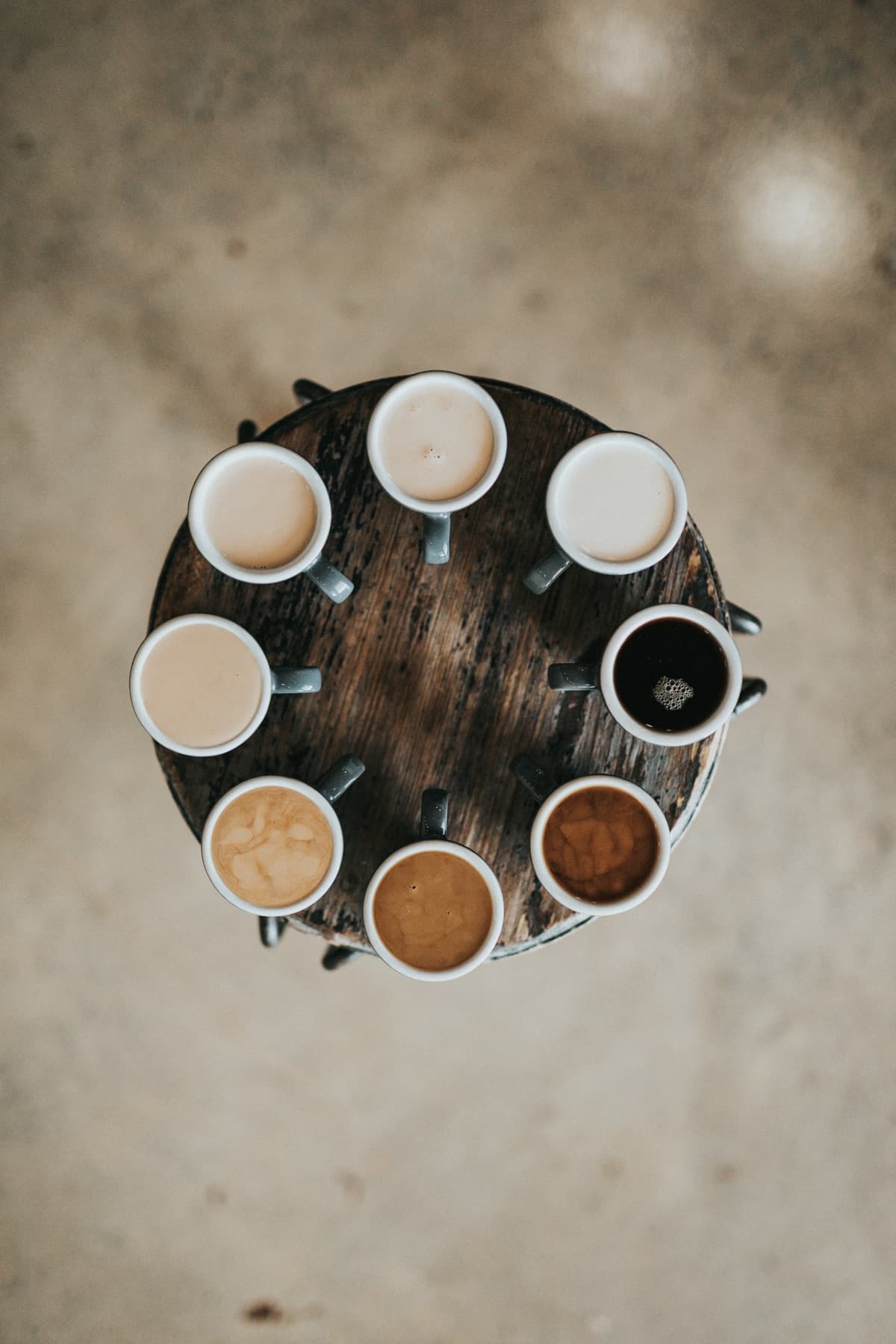 An assortment of coffee drinks in mugs — the range of preferences a P1 Refreshments office coffee program is built around